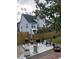 Spacious backyard featuring a patio with outdoor seating, a grill, and a manicured lawn at 917 Widewaters Pkwy, Knightdale, NC 27545
