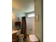 Bathroom featuring neutral paint, toilet, tub and shower combination at 917 Widewaters Pkwy, Knightdale, NC 27545