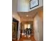 Open-concept dining room with wood floors and bright natural light, perfect for entertaining at 917 Widewaters Pkwy, Knightdale, NC 27545