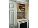 Laundry room featuring washer, dryer, and built in cabinets at 917 Widewaters Pkwy, Knightdale, NC 27545
