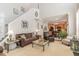 Inviting living room with natural light, comfortable seating, and open layout to kitchen at 917 Widewaters Pkwy, Knightdale, NC 27545