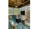 Comfortable screened porch features an outdoor seating area and a ceiling fan at 917 Widewaters Pkwy, Knightdale, NC 27545