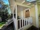 View of house with steps to a covered porch at 116 Dunstan Ave, Durham, NC 27707