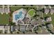 Aerial view shows the community pool, playground, clubhouse, dog park, tennis courts, and parking area at 130 W Crescent Mills Blvd # Homesite 251, Wilson's Mills, NC 27520