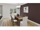 Bright dining room with stylish chandelier, wooden table, area rug, and neutral color palette at 130 W Crescent Mills Blvd # Homesite 251, Wilson's Mills, NC 27520