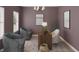 Home office with mauve walls, decor, patterned rug, and comfortable seating at 130 W Crescent Mills Blvd # Homesite 251, Wilson's Mills, NC 27520