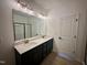 Modern bathroom featuring double vanity, quartz countertop, and sleek fixtures at 130 W Crescent Mills Blvd # Homesite 251, Wilson's Mills, NC 27520