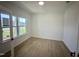 A bright and open room with a large window, allowing for lots of natural light and exterior views at 130 W Crescent Mills Blvd # Homesite 251, Wilson's Mills, NC 27520