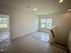 Bright bedroom with large windows providing ample natural light at 130 W Crescent Mills Blvd # Homesite 251, Wilson's Mills, NC 27520