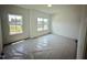 Spacious bedroom with two large windows offering great views at 130 W Crescent Mills Blvd # Homesite 251, Wilson's Mills, NC 27520