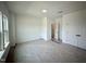 Spacious bedroom with walk-in closet, and lots of natural light at 130 W Crescent Mills Blvd # Homesite 251, Wilson's Mills, NC 27520