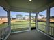 Covered patio with views of the backyard and neighboring homes at 130 W Crescent Mills Blvd # Homesite 251, Wilson's Mills, NC 27520