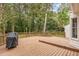 Spacious wooden back deck, perfect for outdoor entertaining or relaxing in nature at 1316 Raybon Dr, Wendell, NC 27591