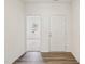 Bright foyer with hardwood flooring and a view into the next room at 140 Oat Grain Ct, Clayton, NC 27520