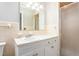 Bathroom featuring retro tile, a large mirror and shower with glass door at 1405 N Sellars Mill Rd, Burlington, NC 27217
