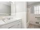 Bright bathroom features a tub and shower combination, updated vanity, and classic fixtures at 1405 N Sellars Mill Rd, Burlington, NC 27217