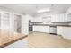Functional kitchen with white cabinets, stainless steel appliances, and durable countertops at 1405 N Sellars Mill Rd, Burlington, NC 27217