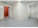 Bright room with a door and a brick-walled area, offering versatility for various uses at 1405 N Sellars Mill Rd, Burlington, NC 27217