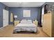 Cozy bedroom featuring carpet flooring and decorative furniture at 173 Allie Dr, Garner, NC 27529