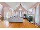 Spacious living room with vaulted ceilings, fireplace, hardwood floors, and natural light at 173 Allie Dr, Garner, NC 27529