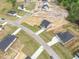 Birds-eye view of a new construction neighborhood featuring newly built homes at 173 Wild Turkey Way, Lillington, NC 27546