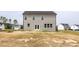 Exterior of house, view from the backyard with recently laid sod at 173 Wild Turkey Way, Lillington, NC 27546