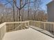 The spacious back deck is ideal for outdoor entertaining and relaxation with wooded views at 1961 Indianwood Ct, Raleigh, NC 27604