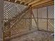 An area under the deck is enclosed by wood lattice and supported by wood beams at 1961 Indianwood Ct, Raleigh, NC 27604
