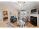 Spacious living area with fireplace and hardwood flooring at 201 Moss Creek Dr, Clayton, NC 27520