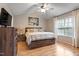 Bright main bedroom with high ceilings, hardwood floors and large windows at 201 Moss Creek Dr, Clayton, NC 27520