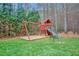 Backyard featuring a playset at 204 Dartmoor Ln, Raleigh, NC 27614