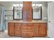 Bathroom featuring a granite vanity, and wooden cabinets at 204 Dartmoor Ln, Raleigh, NC 27614