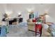 Multi-purpose living area with desk, sofa, and exercise equipment for a comfortable lifestyle at 204 Dartmoor Ln, Raleigh, NC 27614
