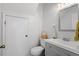 Updated bathroom with a new gray vanity, modern fixtures, and a clean, neutral color scheme at 205 Clancy Cir, Cary, NC 27511