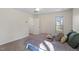 Bedroom with gray walls, a window and carpet floors at 205 Clancy Cir, Cary, NC 27511