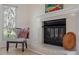 The fireplace is the main feature of this light and bright living room at 205 Clancy Cir, Cary, NC 27511