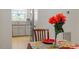 Kitchen view from the dining area, showcasing stainless appliances and tile backsplash at 205 Clancy Cir, Cary, NC 27511