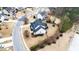 Aerial view of a beautiful backyard with an outdoor patio set and a small trampoline at 222 Friesan Way, Rolesville, NC 27571