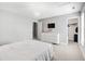 Bedroom with a bed, closet, dresser, and a wall mounted tv at 222 Friesan Way, Rolesville, NC 27571