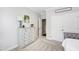 Bright bedroom with neutral walls and a large dresser for ample storage at 222 Friesan Way, Rolesville, NC 27571