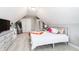 Bright bedroom with white walls, neutral carpet, and twin closets at 222 Friesan Way, Rolesville, NC 27571