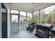 Relaxing screened porch with outdoor seating and grilling area at 222 Friesan Way, Rolesville, NC 27571