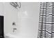 Clean white shower with a rain shower head and decorative shower curtain at 222 Friesan Way, Rolesville, NC 27571