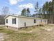 View of house showing large yard at 248 Dutches Ln, Henderson, NC 27537