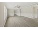 Bright living room with ample natural light, and vinyl floors at 248 Dutches Ln, Henderson, NC 27537