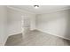 View of living room with vinyl floors and neutral walls at 248 Dutches Ln, Henderson, NC 27537