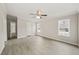 Bright main bedroom featuring neutral walls, vinyl floors, and ample natural light at 248 Dutches Ln, Henderson, NC 27537