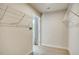 Bright walk-in closet featuring wire shelving and neutral carpeting, offering ample storage space at 26 Artesa Ct, Fuquay Varina, NC 27526