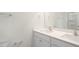 Bathroom features a double sink vanity with white cabinets and brushed hardware at 267 Palm Dr, Sanford, NC 27332