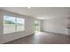 Bright living room with a backyard view and vinyl flooring at 267 Palm Dr, Sanford, NC 27332